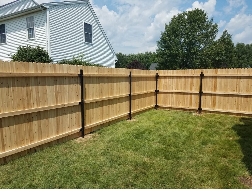 Cedar Stockade with Steel Posts